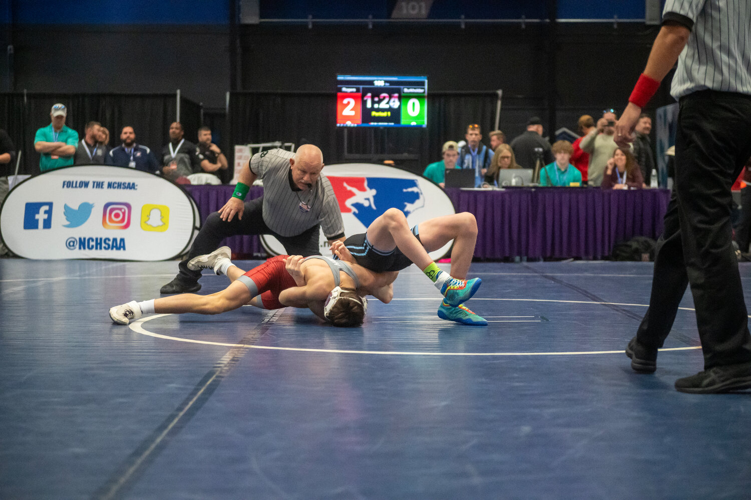 Seaforth’s Gabe Rogers gets the pin over Trinity’s Aiden Burkholder in the 106-lbs weight class during the 2A NCHSAA Dual Meet Championship at the Greensboro Field House. Rogers’ win tied the match, but the Hawks eventually fell, 36-31.
